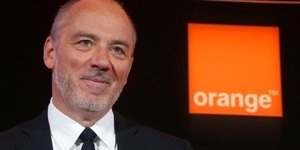 French telecom operator orange ceo stephane richard poses before the company's 2016 annual results presentation in paris